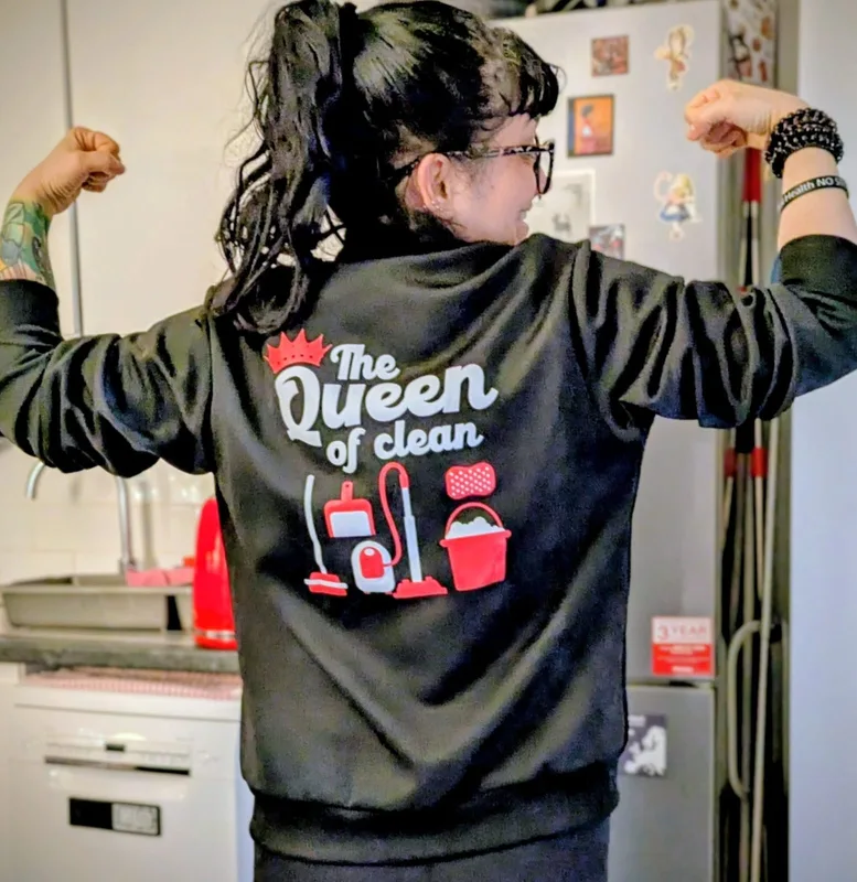 Kari wearing her 'Queen of Clean' jacket